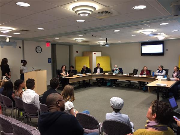 Students presenting to the School Committee 